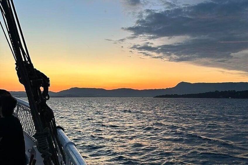 Soothing Sunset Escape: A Wooden Boat Cruise with