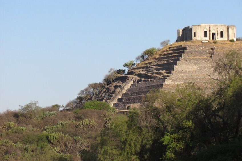 Pyramid's south side and small fortress on top.