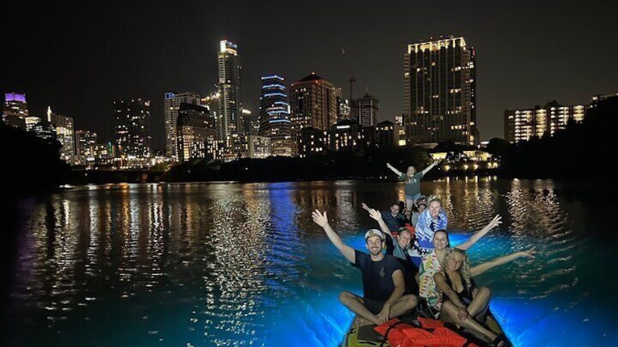 Giant Glow Paddleboard the Downtown Skyline at Sunset with Bats