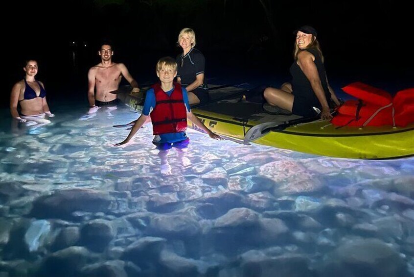 Giant Glow Paddleboard the Downtown Skyline at Sunset with Bats