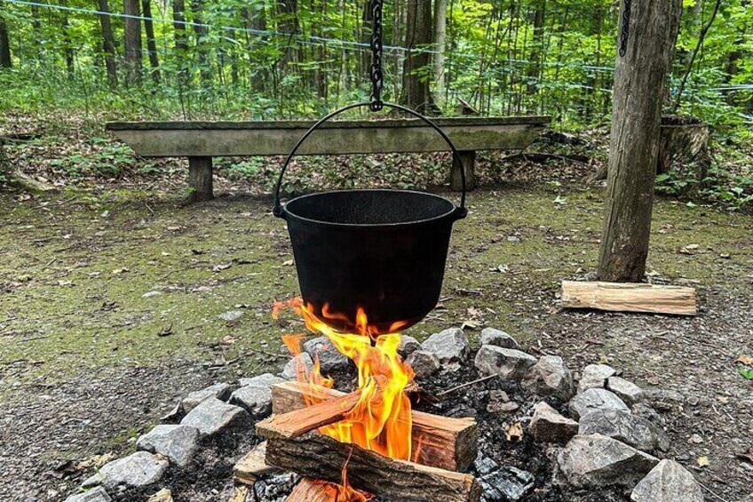 Maple Syrup cooking to make Taffy on Snow