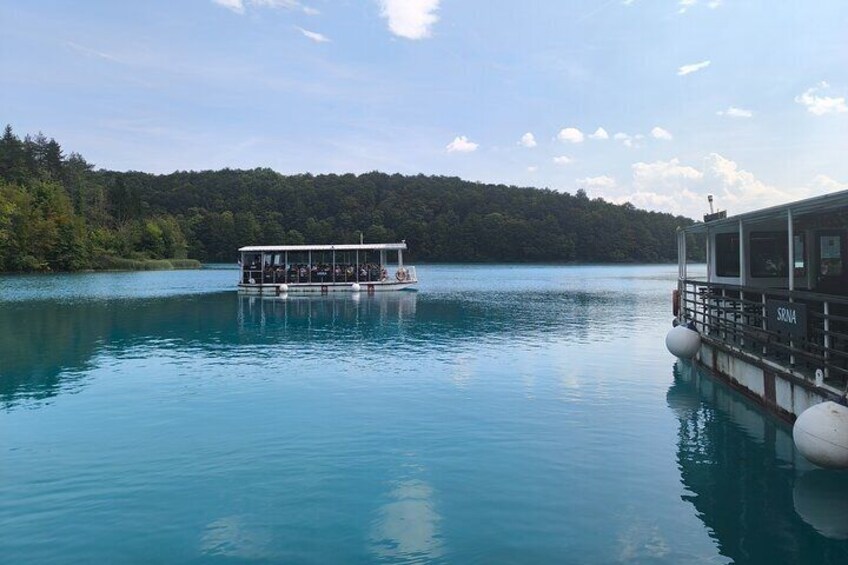 Fairy boat a cross the Kozjak lake 