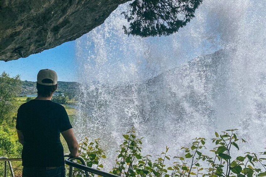 Walking behind the Steindalfossen waterfall is a rare experience. 