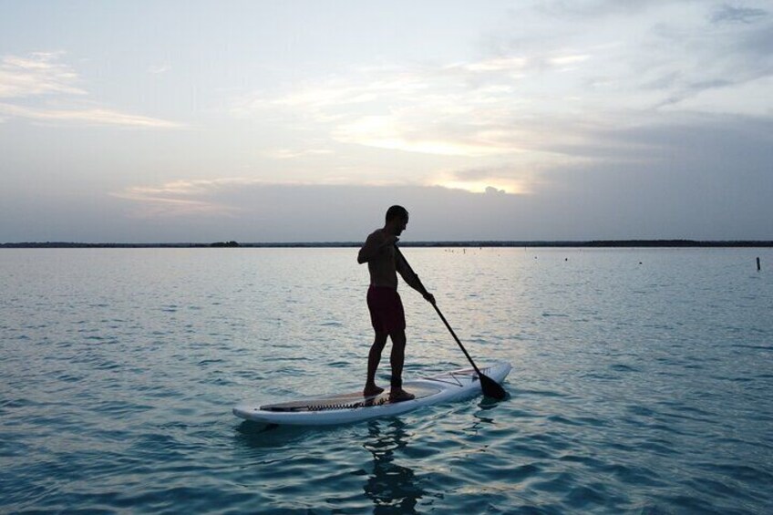 Sunrise on Paddleboard with breakfast in the lagoon of 7 colors