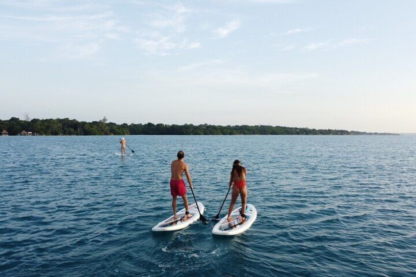 Sunrise on Paddleboard with breakfast in the lagoon of 7 colors