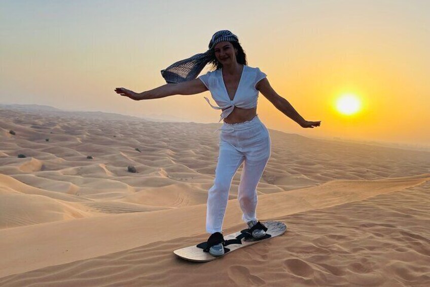 Sunrise Desert Safari with Sand Boarding and Camel Ride