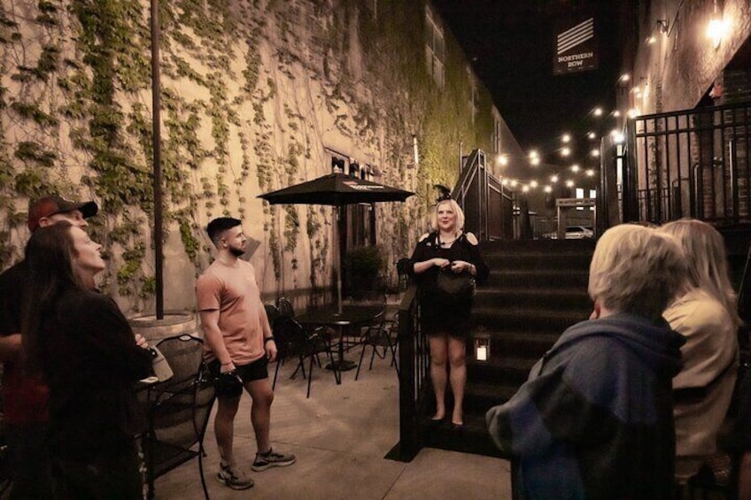 Miranda leading a tour group on the Nightmare on Elm street haunted walking tour.