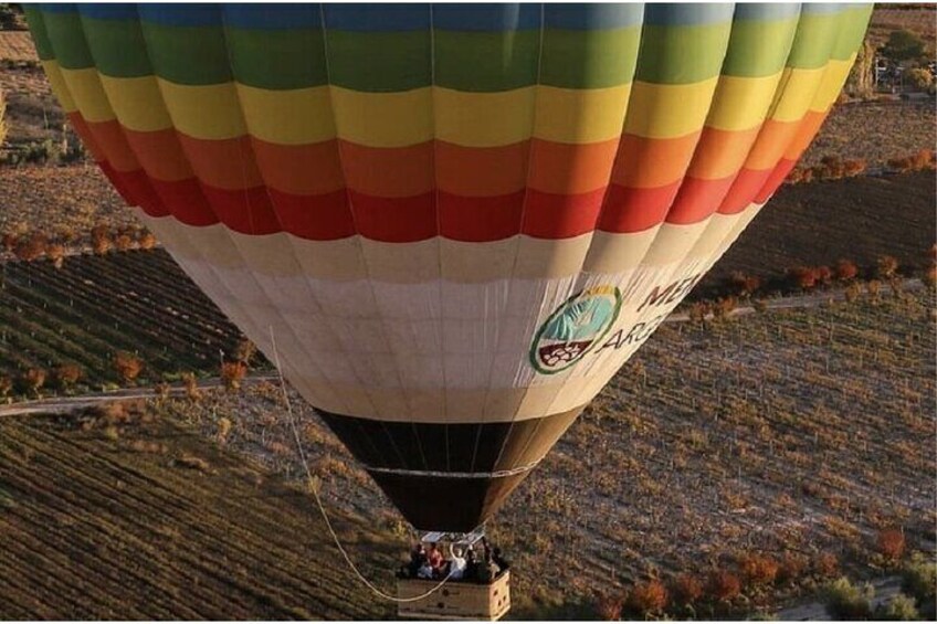 Golden Skies of Mendoza: Balloon Flight at Sunset