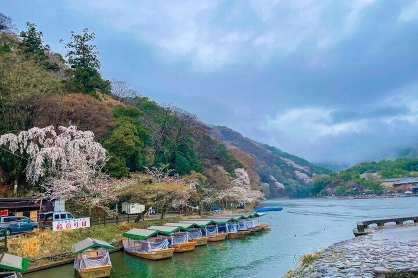 boat riding from the shore of Katsuragawa in Arashiyama