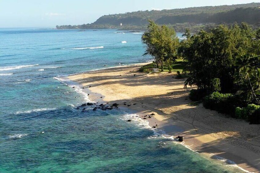 Learn to surf in with the great view and a crystal clear water of the North Shore