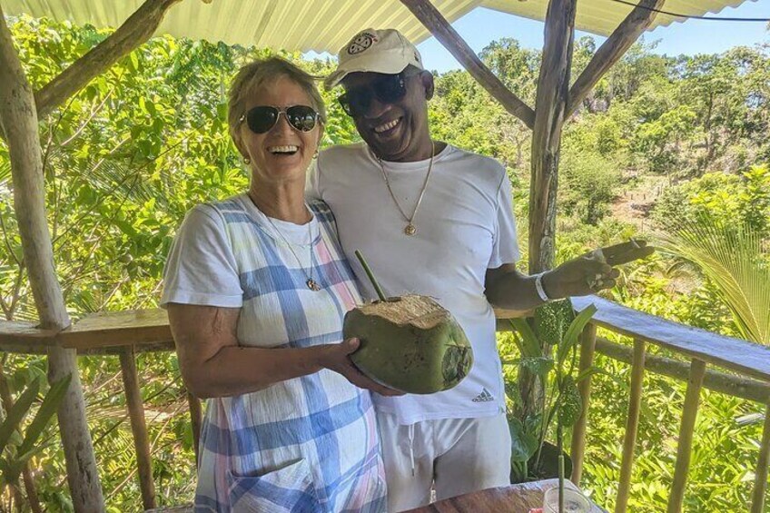 Visitors from Lucea enjoying fresh coconut
