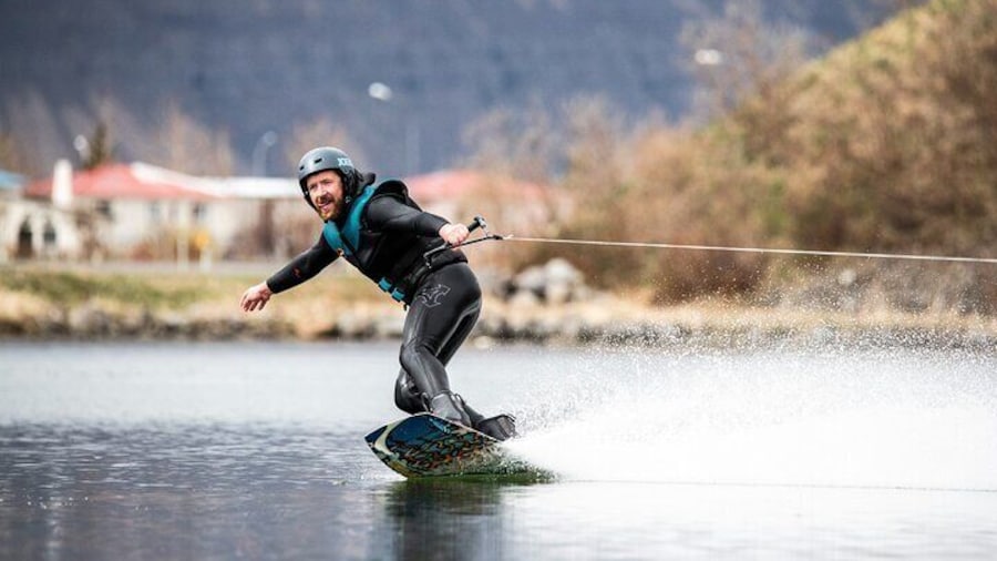 Sightseeing and wakeboarding, waterskiing experience in Dynjandi