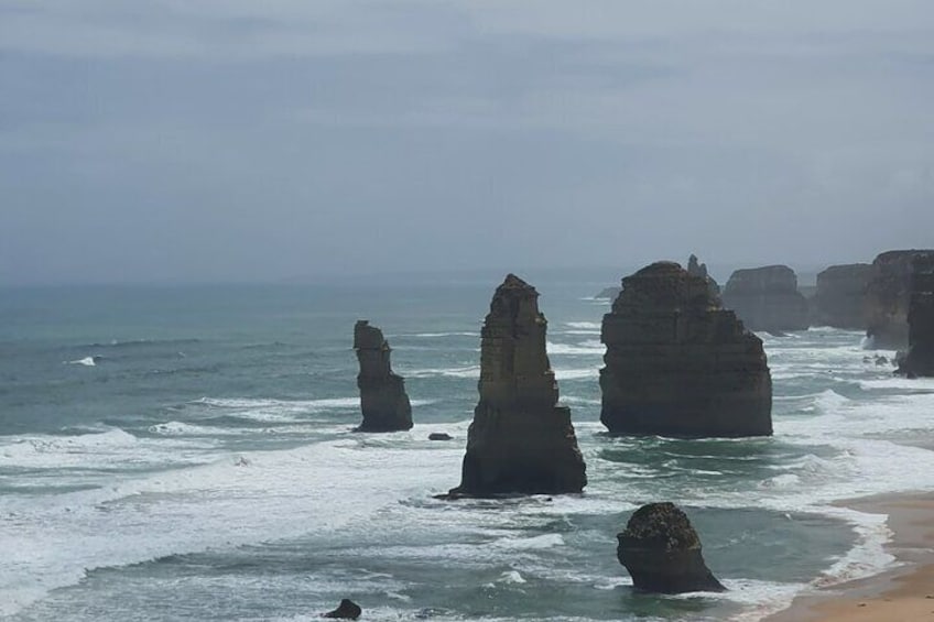 12 Apostles, Nature's beauty at it's finest with stunning view of rocky shoreline. 