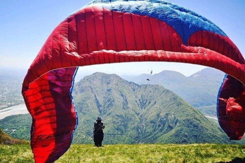 Paragliding flight over the Gardens of Ninfa