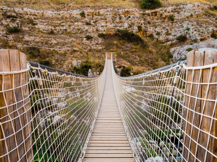 Murgia Park Trekking crossing the Tibetan Bridge