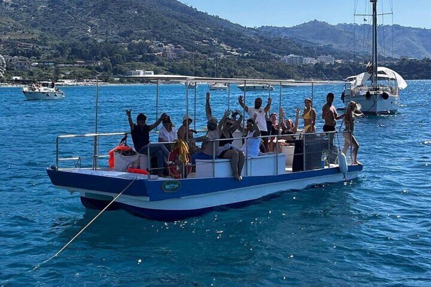 Discovering Cefalù's Coastline Activity on a Mini Catamaran