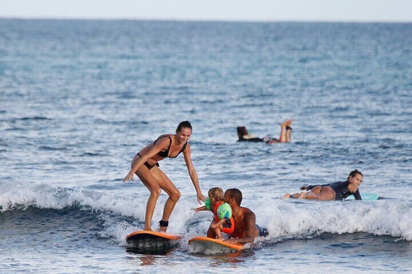 Happy family surfing