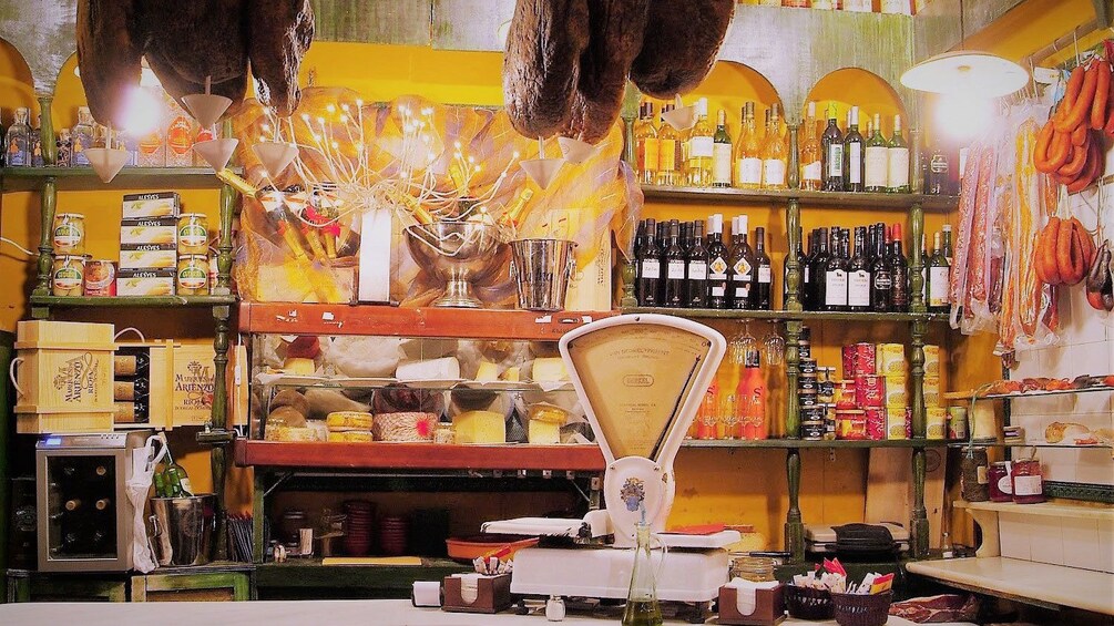 Interior of shop with wine and dried preserved goods in San Lorenzo