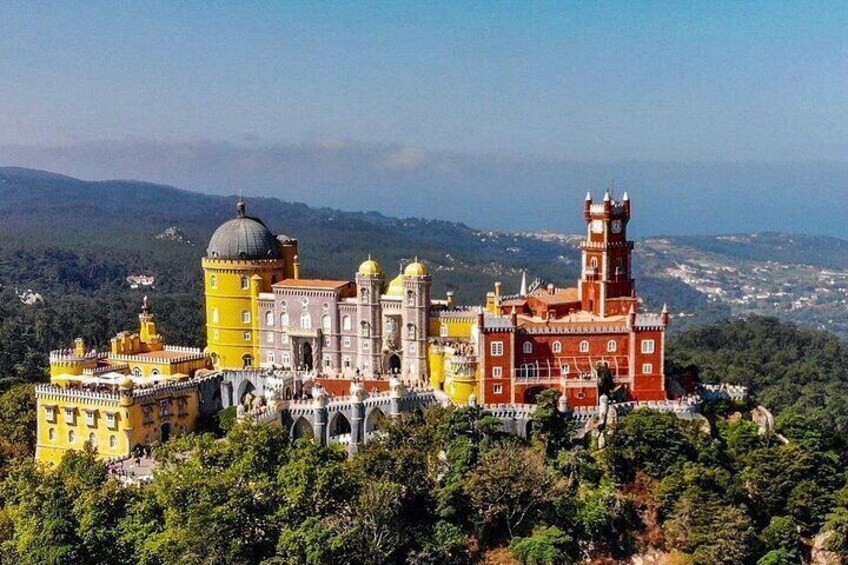 The jewel in the crown of the artist king.
"And there, far up above, the jewel of Sintra" 
The views of Pena Palace are breathtaking, and it's definitely worth visiting

