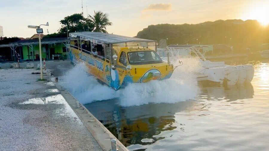 Amphibious bus converting in a boat