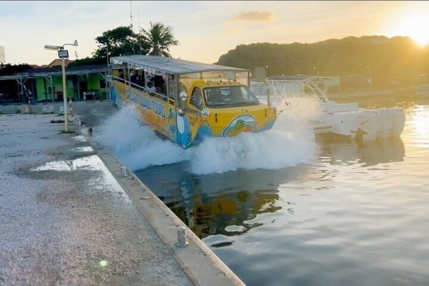 Amphibious bus converting in a boat