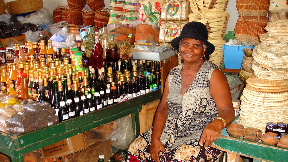 Woman selling Rum in St. Lucia