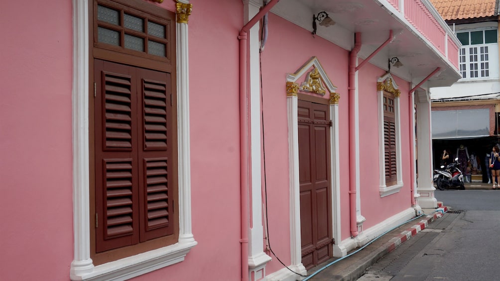 Show item 4 of 4. Pink building in Phuket