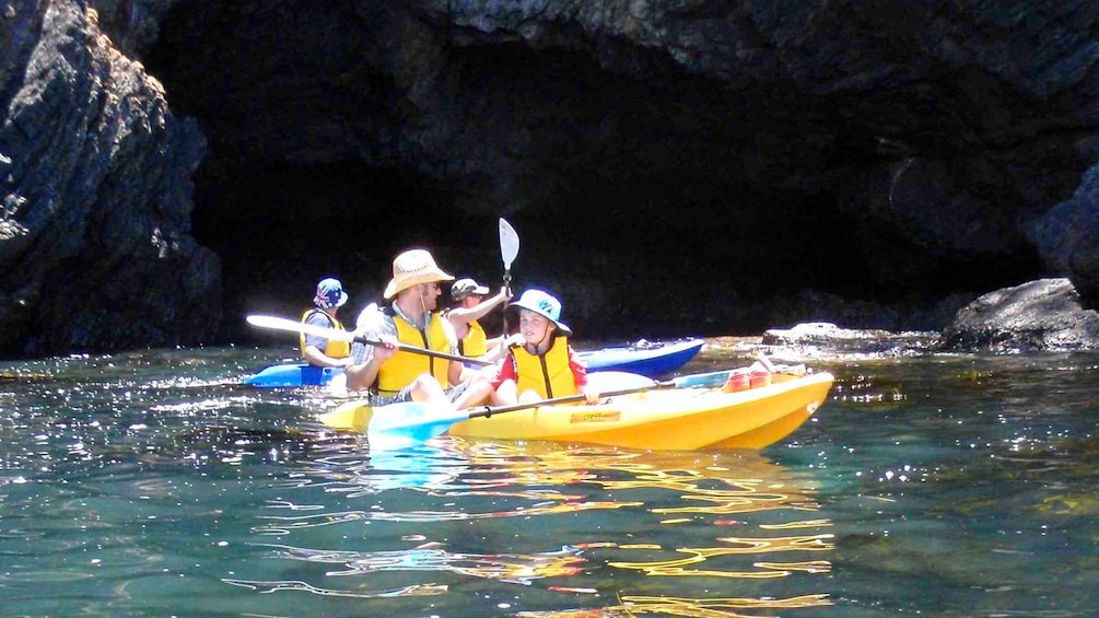 Group of kayakers paddle around Batemans Bay