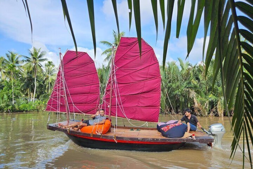 Sail boat trip on Mekong River with no other tourists around