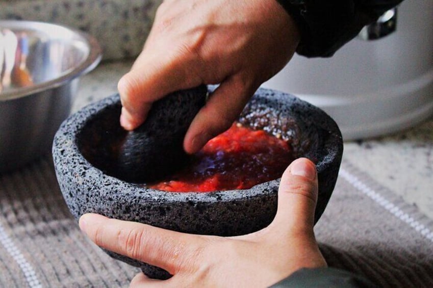 You will learn how to use a Molcajete