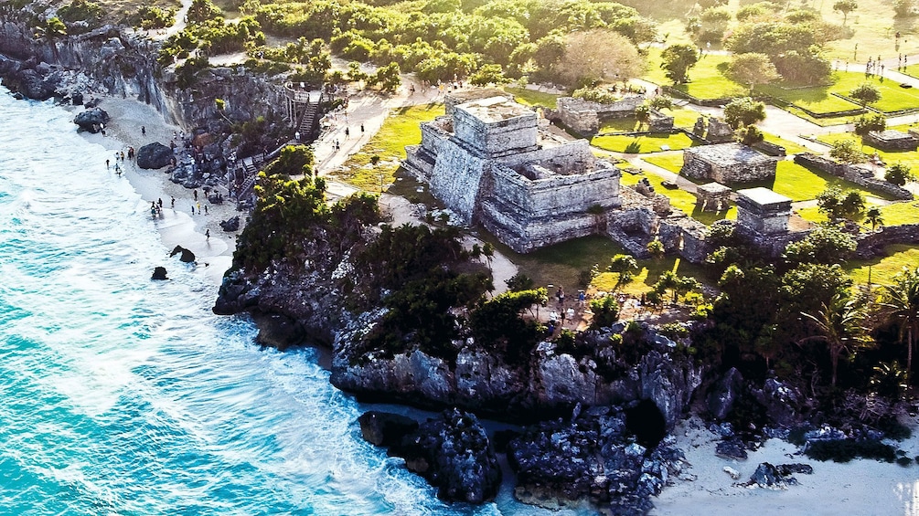 Ariel image of the ruins of Tulum near the rocky shore in Cancun