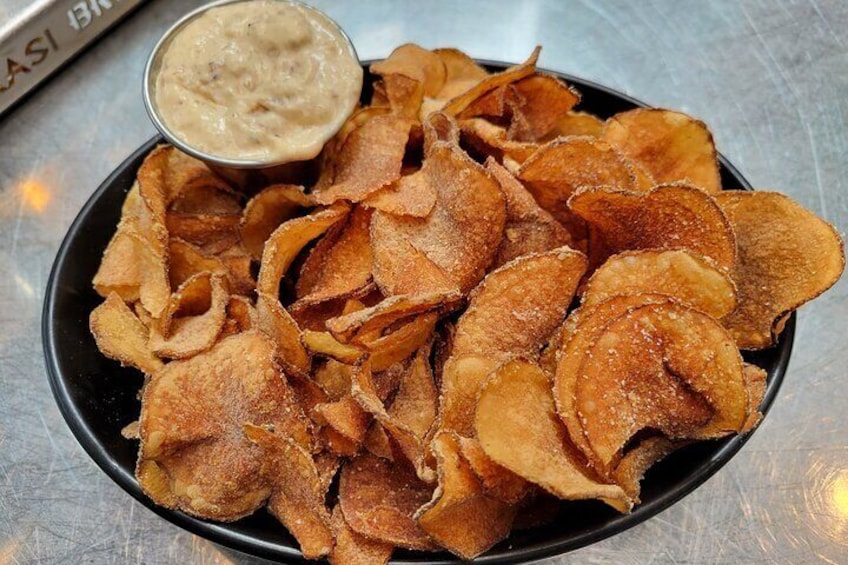 Malt vinegar chips with caramelized onion dip from Ninkasi's The Better Living Room