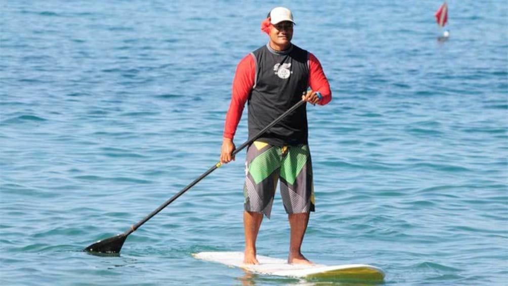 Show item 1 of 4. Man on the Kihei SUP Lesson