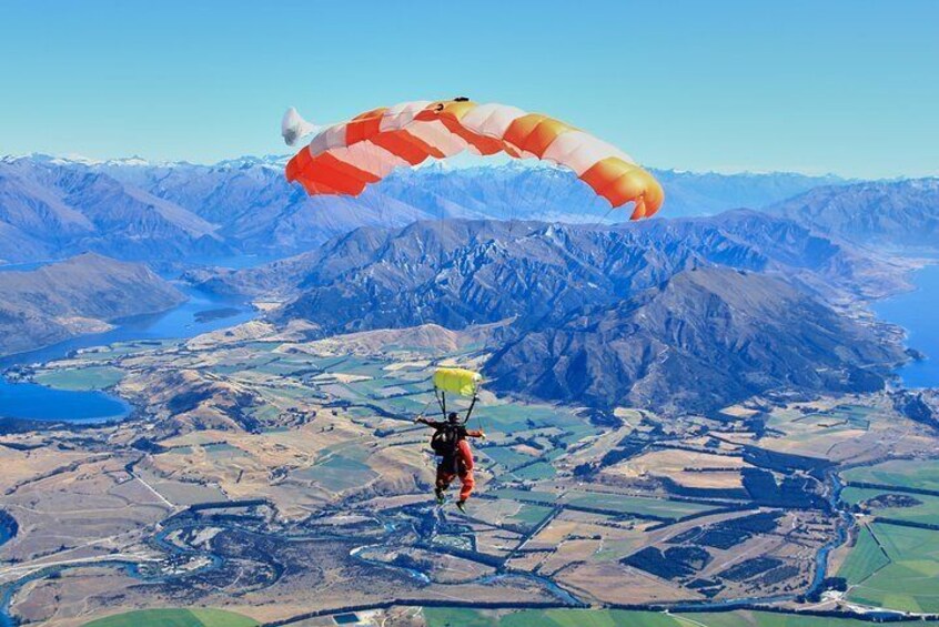 Experience stunning views of Lake Wanaka (left) and Lake Hawea (right)