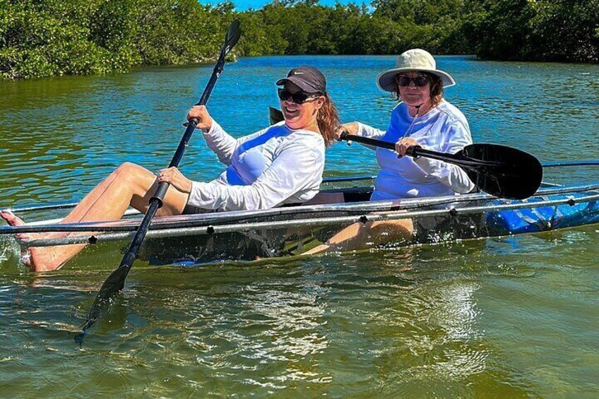Who are you paddling with on our guided clear kayak tour? 