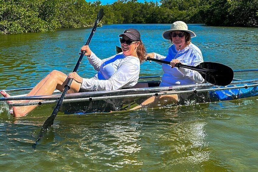 Who are you paddling with on our guided clear kayak tour?