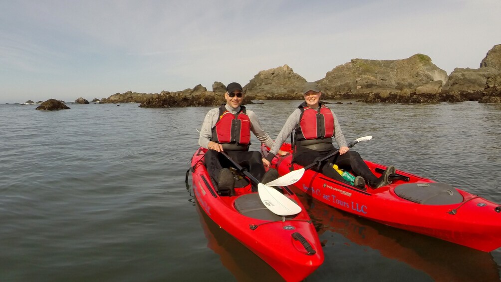 Couple on kayaks in Oregon