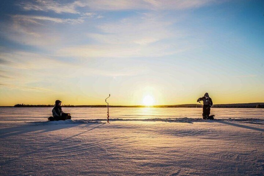 Ice Fishing on a Frozen Lake in Levi