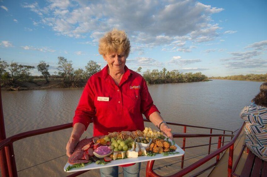 Enjoy onboard nibbles platters, Drover's Sunset Cruise