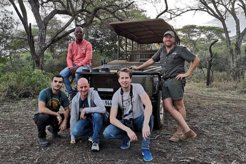The safari team with 3 of our adrenaline junkie travellers. Also your game drive vehicle when you go on safari with us.