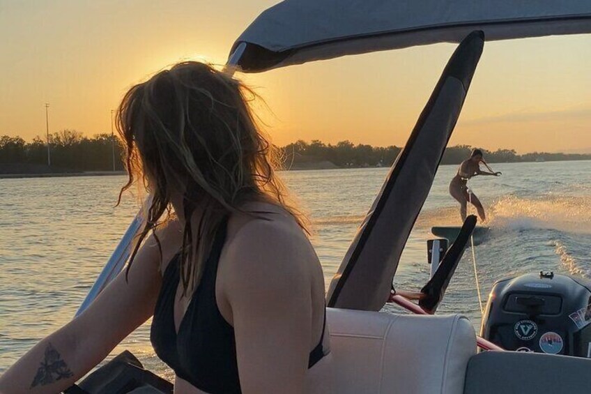 Hydrofoil and surfing on the Rhine behind a motorboat