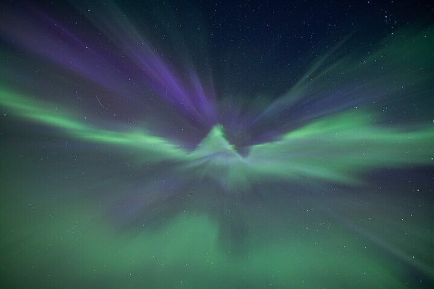 Funky shapes of Northern Lights overhead