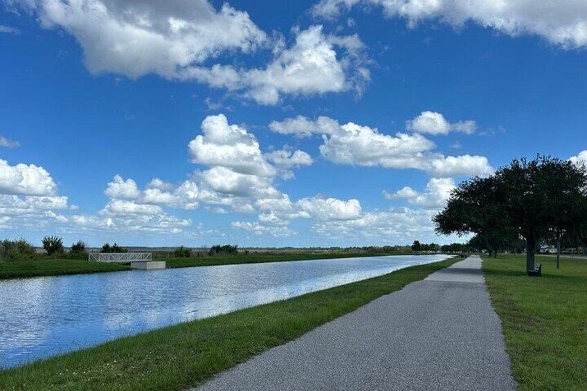 Beautiful blue skies over the lakefront path along the St. Cloud Lakefront.