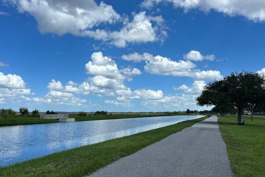 Beautiful blue skies over the lakefront path along the St. Cloud Lakefront.