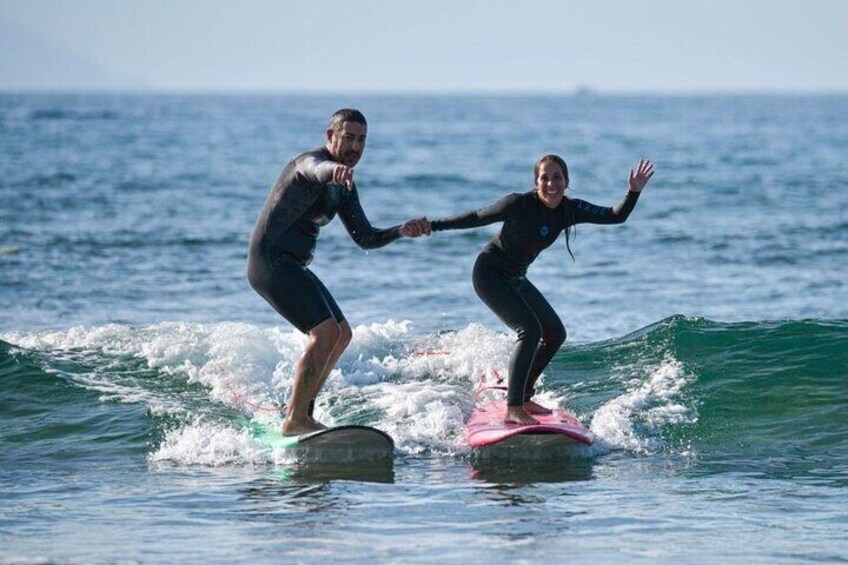 surfing as a couple, joy and fun to remember