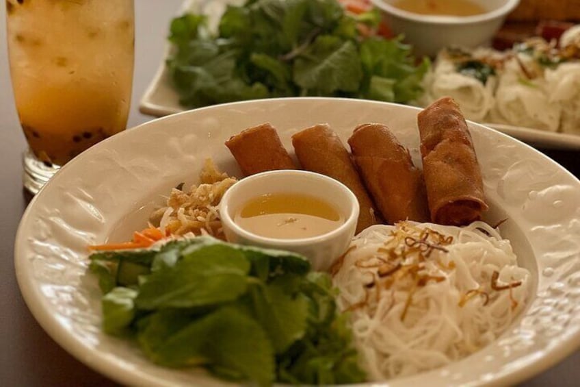 Vegan egg rolls with imitation fish sauce, vermicelli rice noodles, and vegetables