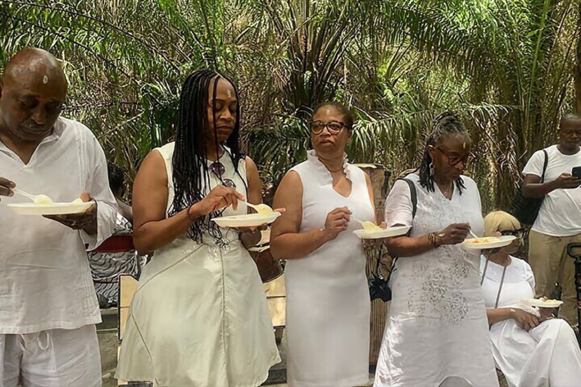 Traditional food been tast by some section of African Diasporas..