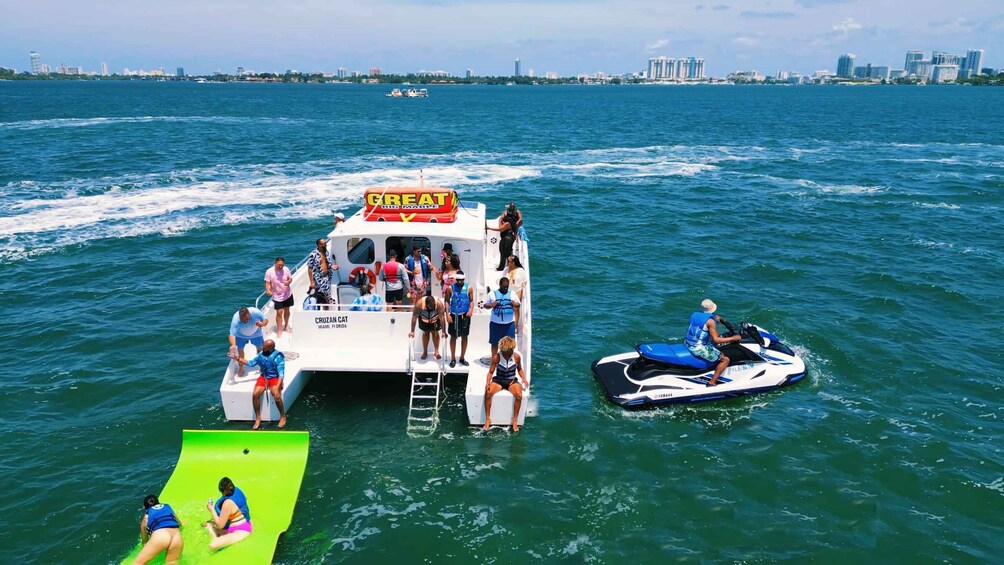 Miami: Catamaran Cruise with Water Sports Package and Party