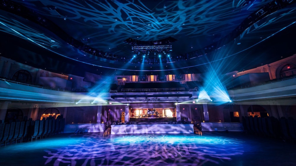 Performance area lit up with stage lights at the Hard Rock Cafe in Orlando.