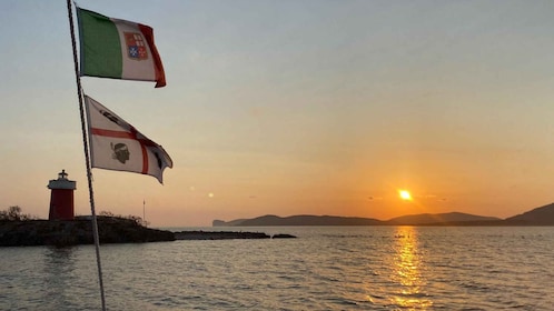 Alghero : Excursion à bord d'un bateau d'époque au coucher du soleil